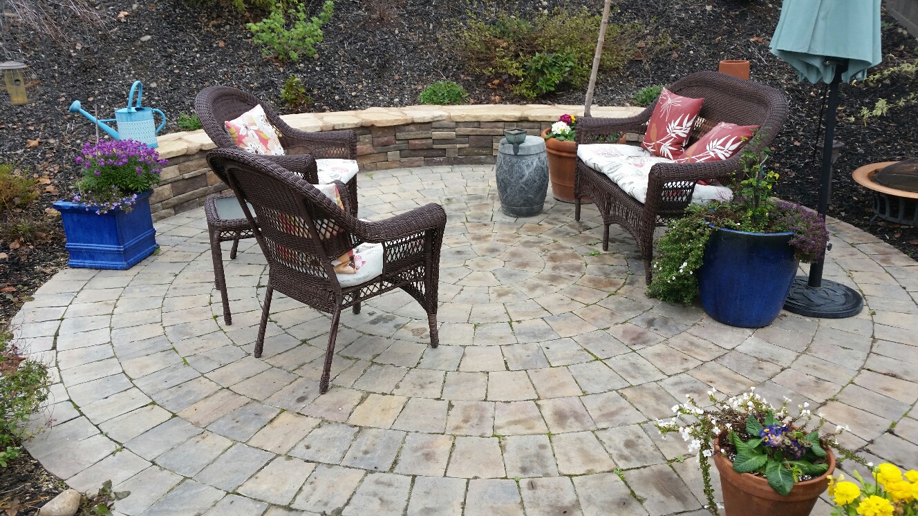 Stone Patio with Wicker Deck chairs